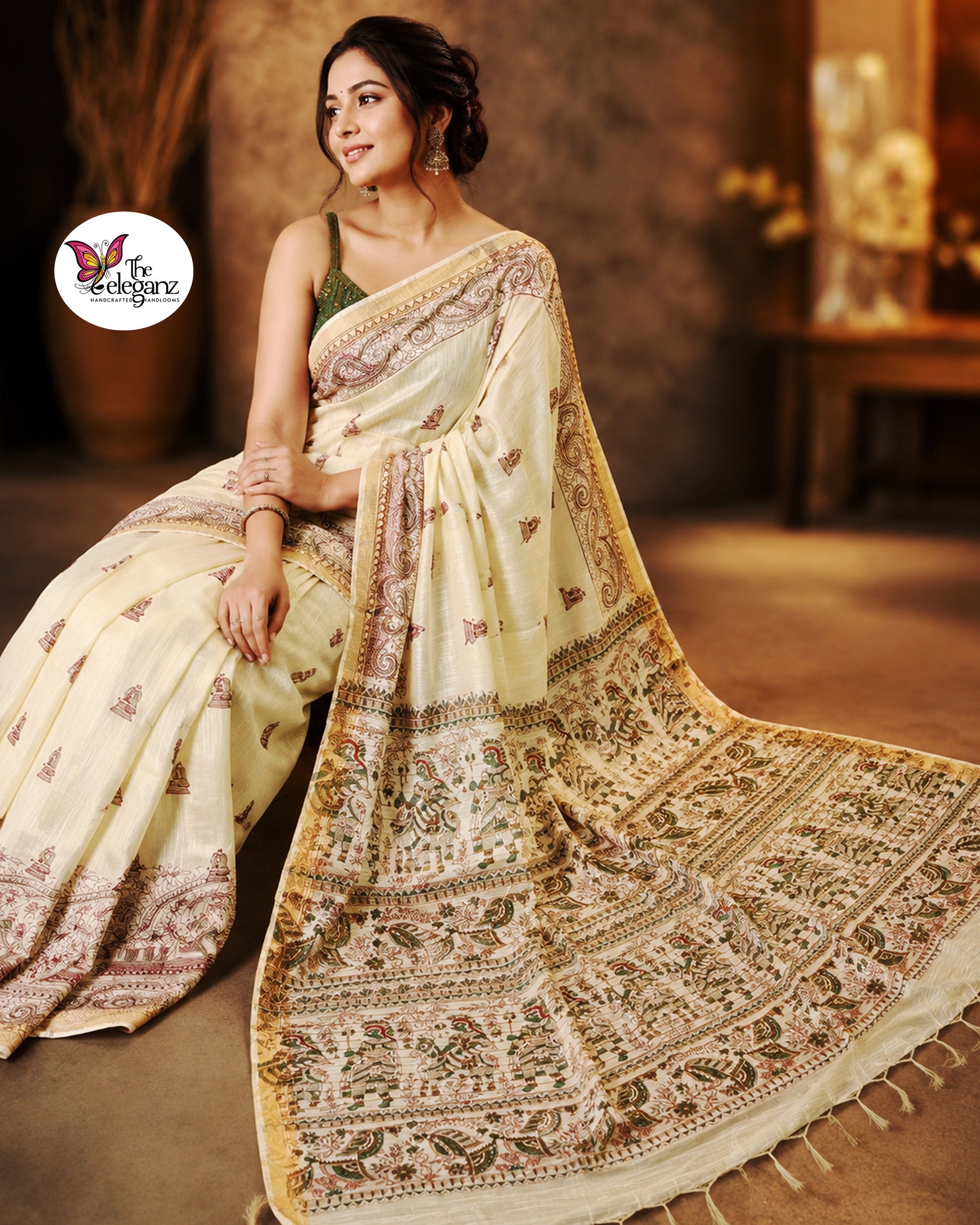 Woman draped in light lemon-yellow Cotton Silk Madhubani saree featuring traditional folk art figures, paisley motifs, and heritage-inspired decorative borders.