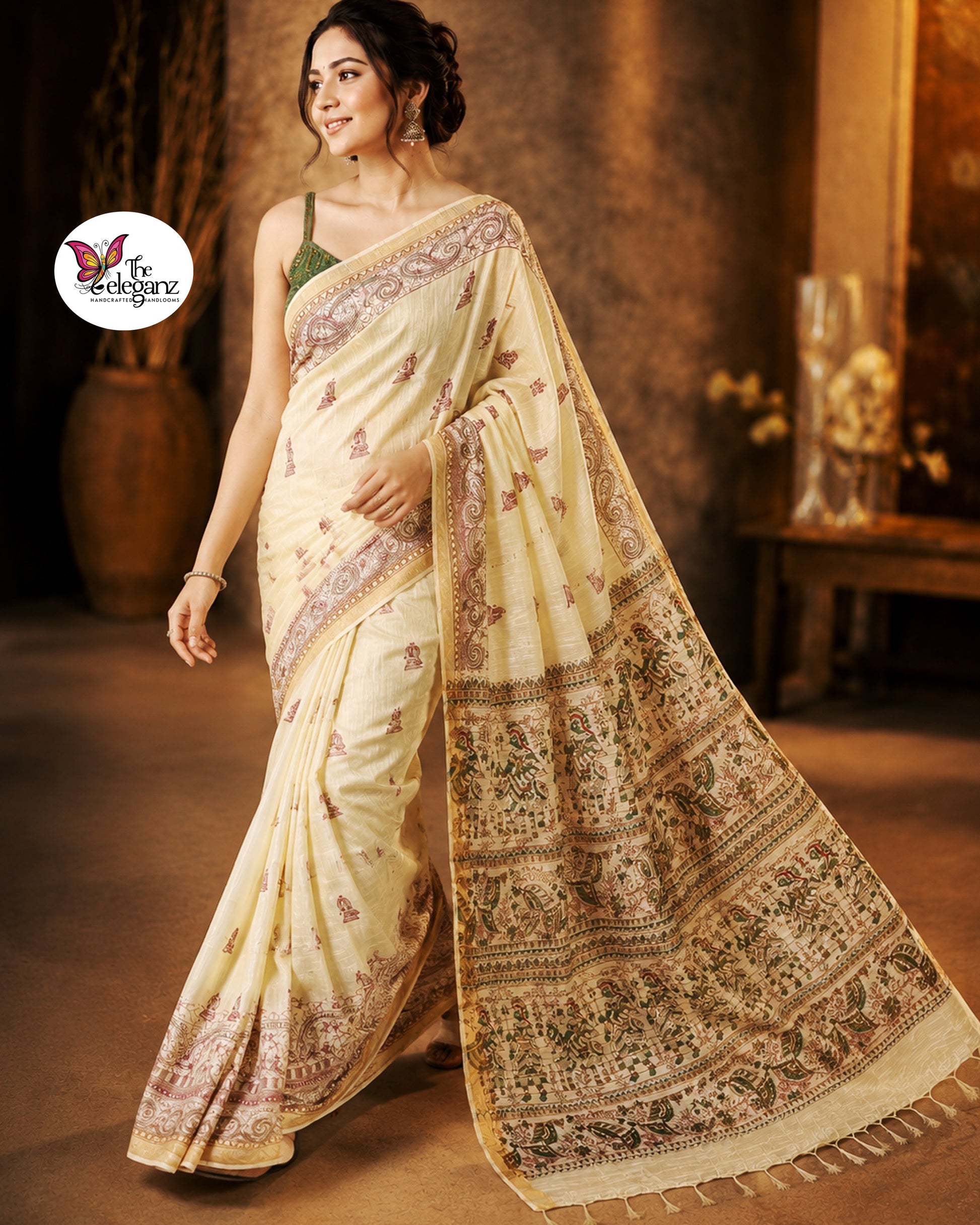 Woman draped in light lemon-yellow Cotton Silk Madhubani saree featuring traditional folk art figures, paisley motifs, and heritage-inspired decorative borders.