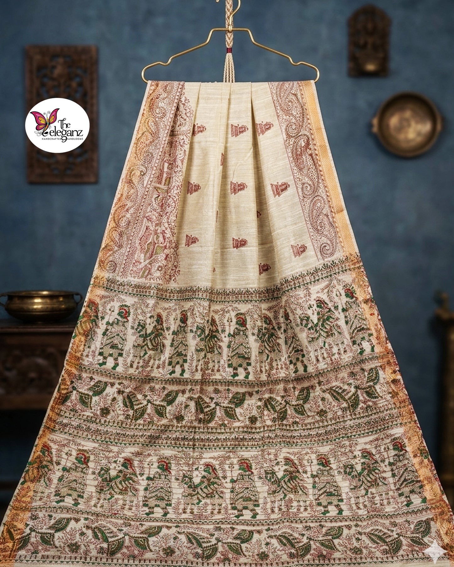 Woman draped in light lemon-yellow Cotton Silk Madhubani saree featuring traditional folk art figures, paisley motifs, and heritage-inspired decorative borders.